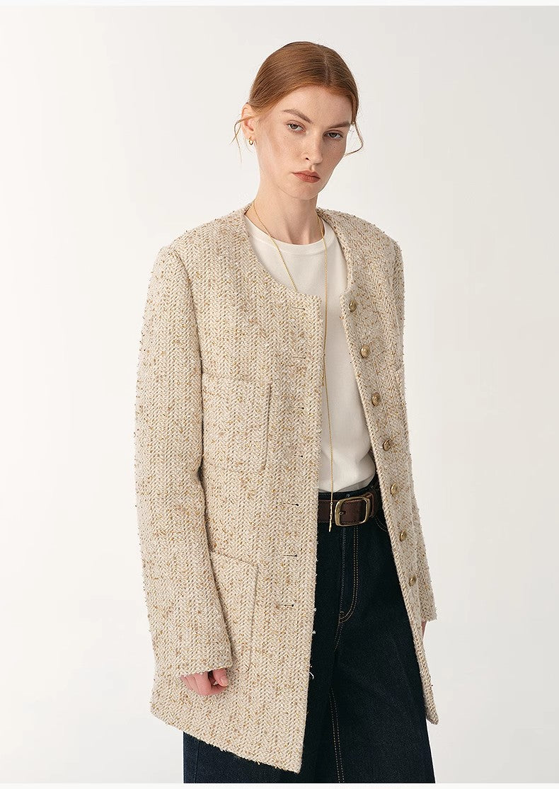 Firelady Sheepskin wool suit jacket from Maison Beaumont, featuring a tailored fit with a cozy, textured wool fabric.