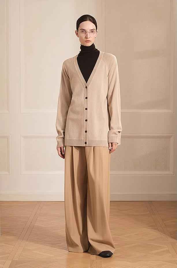 Loose Australian Merino wool V-neck knitted cardigan from Firelady Fur, styled as a cozy, lightweight outfit piece.