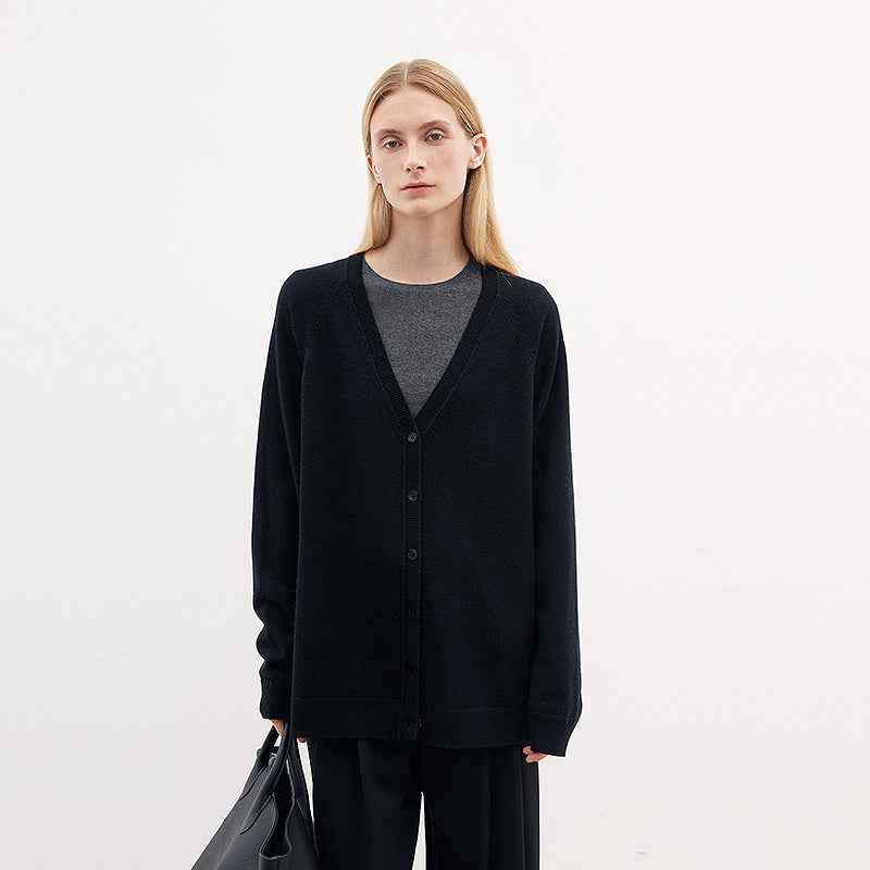 Firelady Fur merino wool knitted V-neck cardigan in a loose fit, styled as a cozy, stylish outfit from Maison Élvorain.