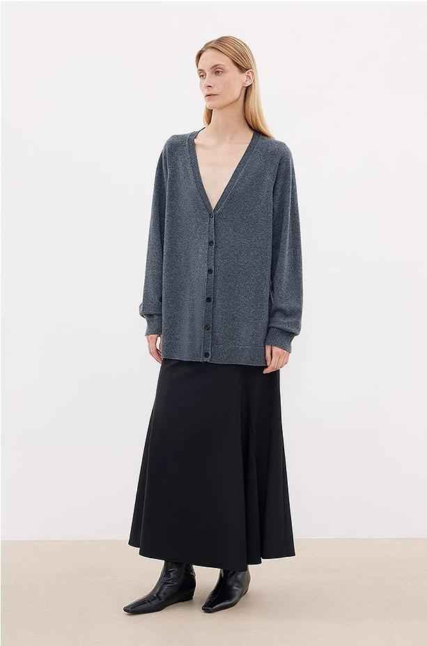 Firelady Fur merino wool knitted V-neck cardigan, loose fit, in neutral tones, styled as a cozy, stylish outfit piece.
