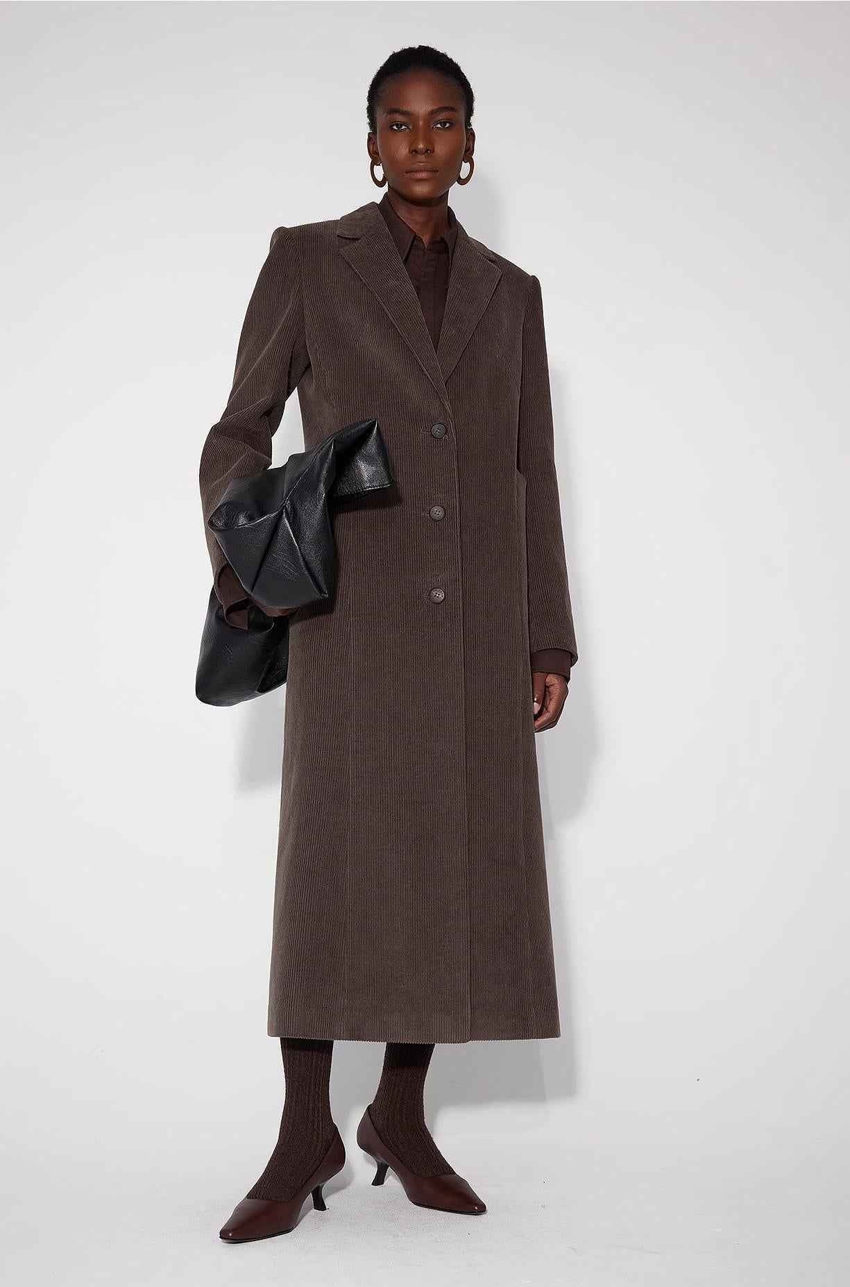 Women's corduroy waist coat with three-dimensional pockets by Firelady Fur, featuring a stylish outerwear design.