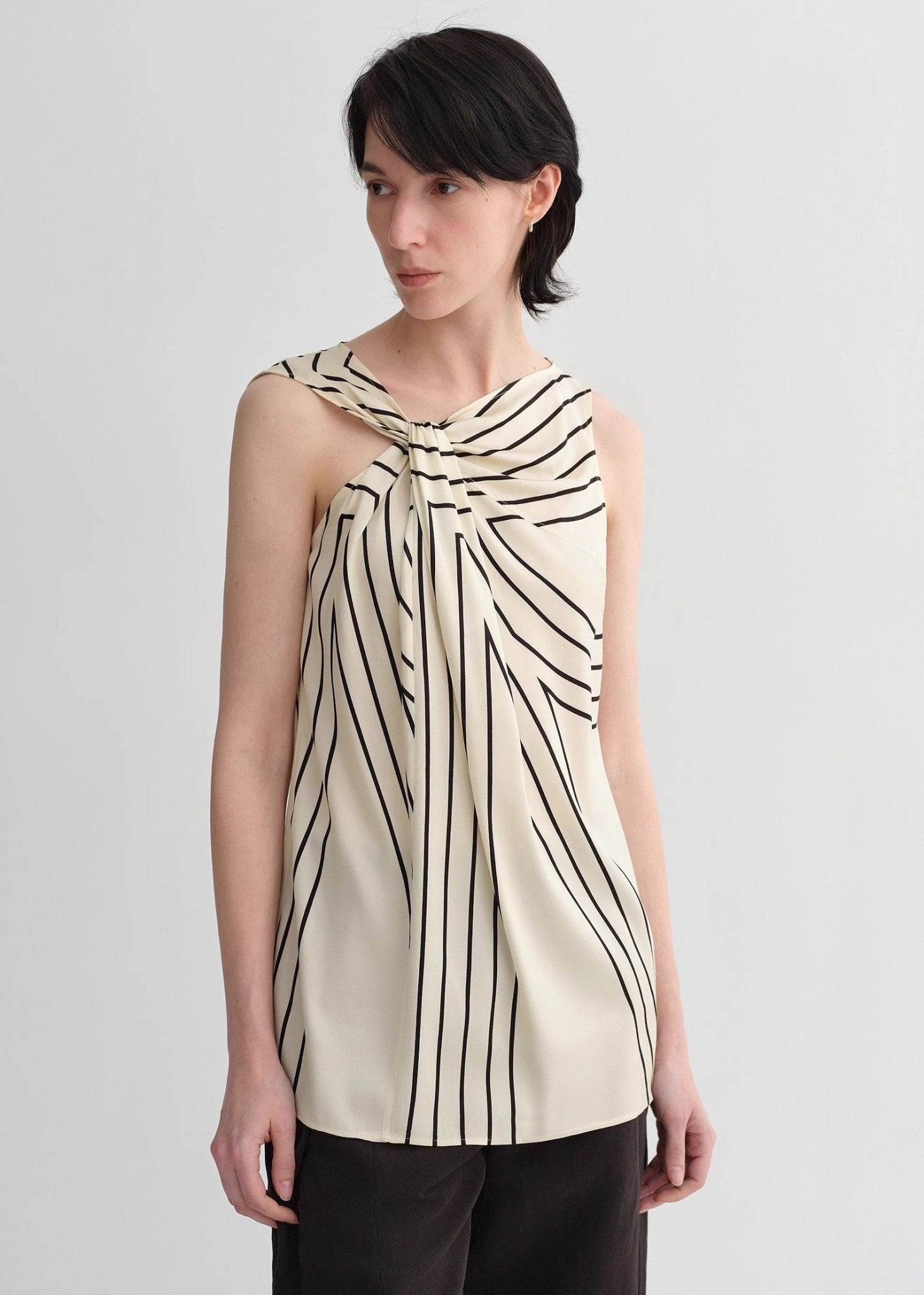 Silk sleeveless shirt by Firelady Fur featuring a twisted collar, geometric print, slim fit, perfect for multi-occasion wear.