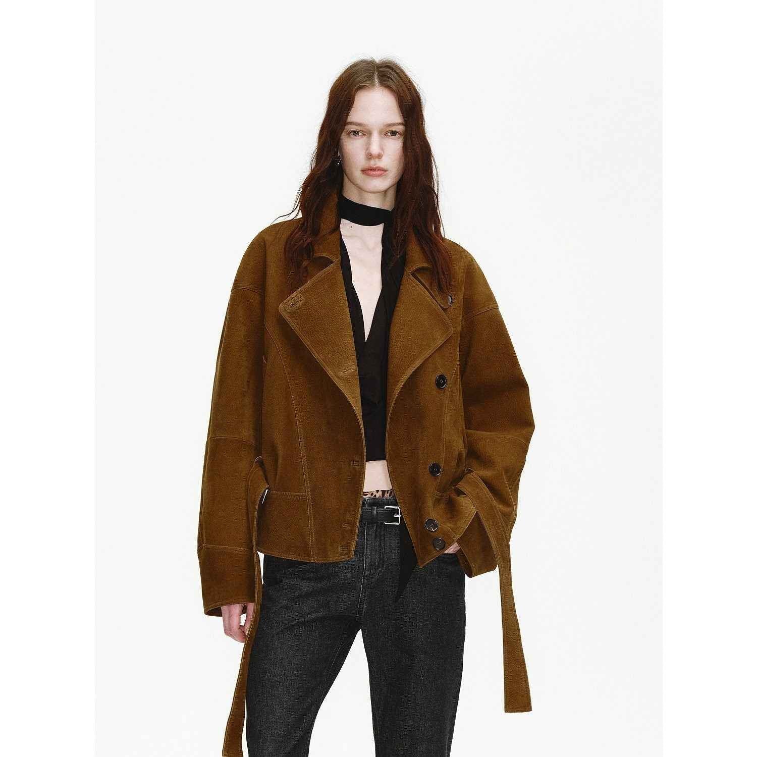 Firelady Fur women's waxed sheepskin biker coat with belted waist and asymmetric lapel in Peninsula Black Tea leather.