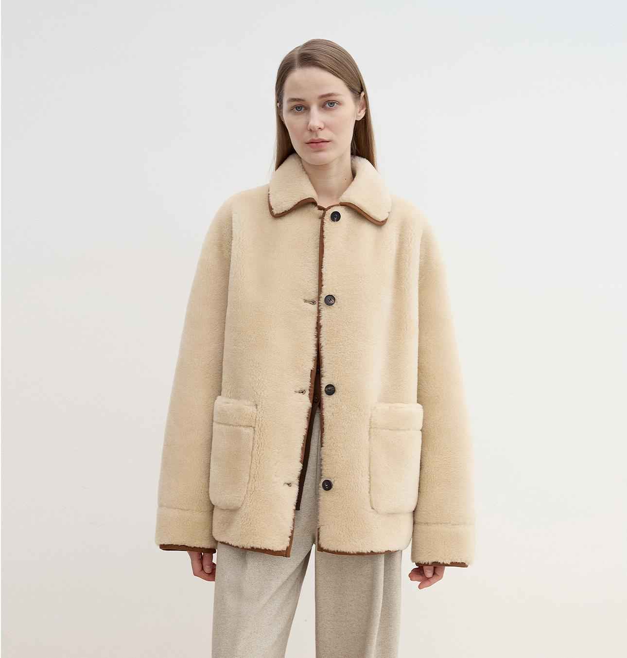 Women's faux leather shearling jacket with furry lapel from Firelady Fur, featuring a casual straight wool coat design.