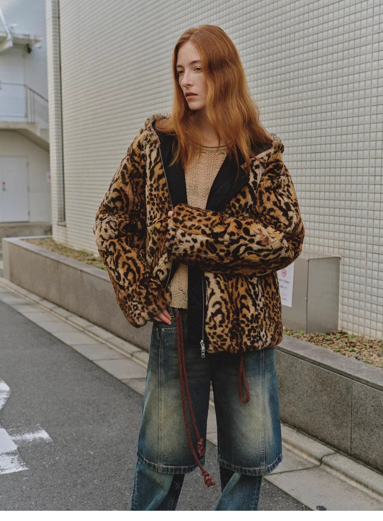 Women's Firelady Fur leopard spot print reversible rabbit fur coat with drop shoulder hood in a stylish leopard fantasy design.