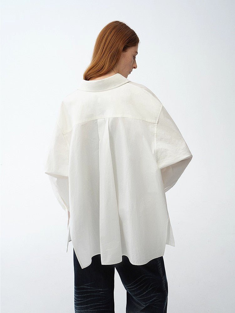 Firelady Fur Moonlight Vermilion shirt, loose casual silhouette, deconstructed waist design, standing portrait.