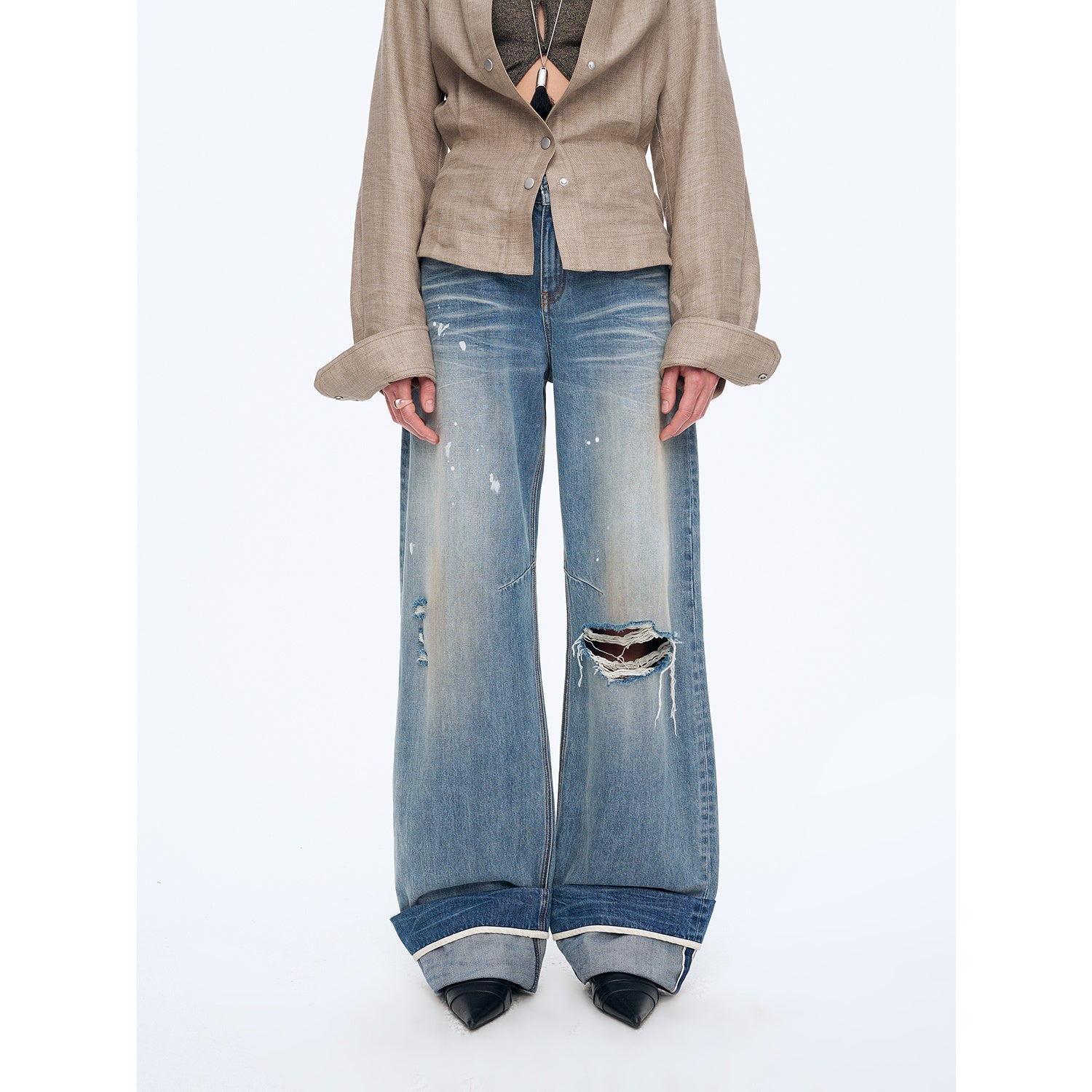 West Coast straight-cut jeans by Firelady Fur featuring ink splashed detailing, perfect for a refreshing casual look.