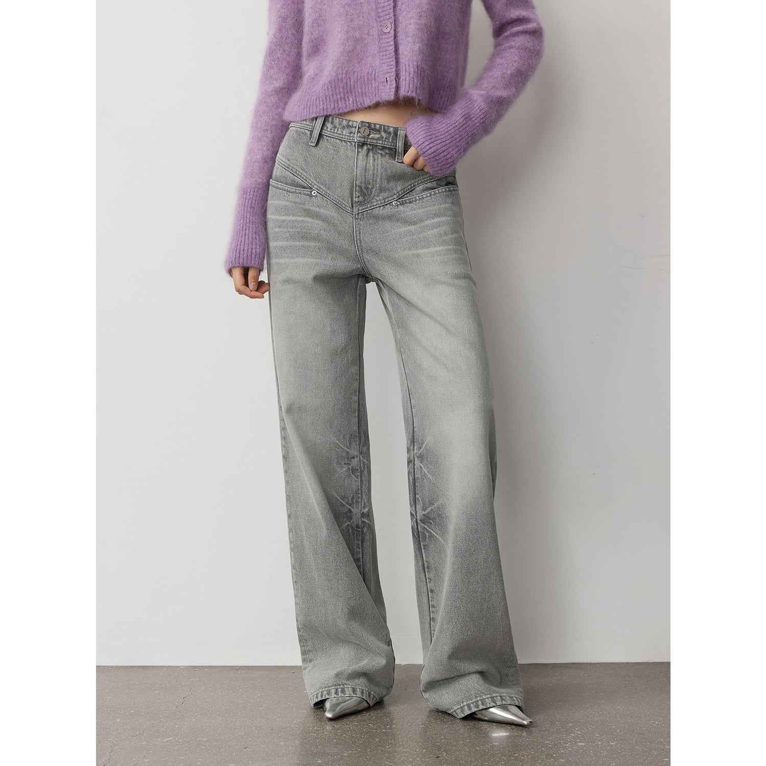 Women's distressed straight-leg denim trousers by Firelady Fur with vintage wash, marble pattern, and textured V-shaped design.