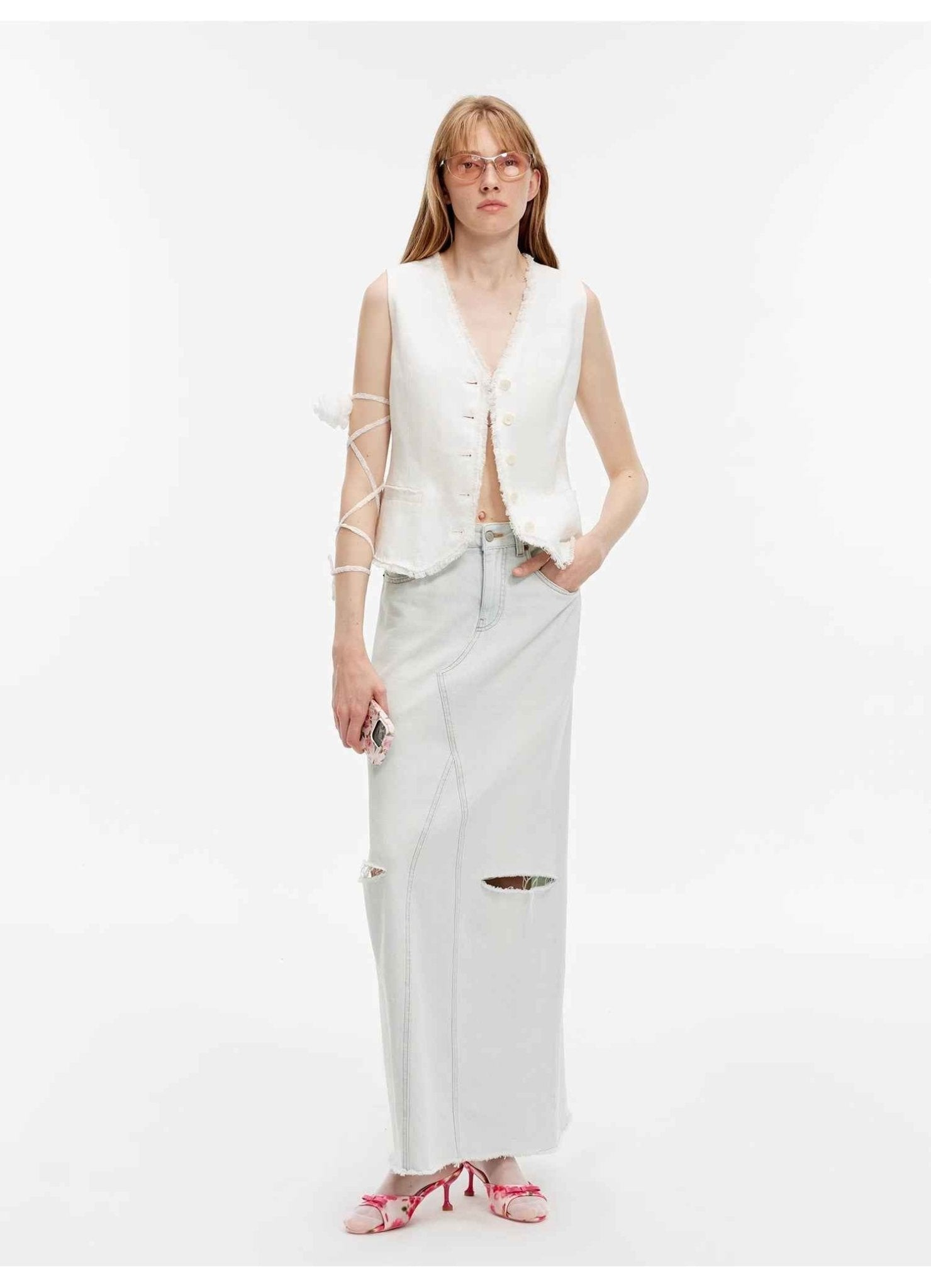 Women's "Walden Pond" Turkish imported faded distressed denim A-line skirt by Firelady Fur, featuring wash-faded and hole details.