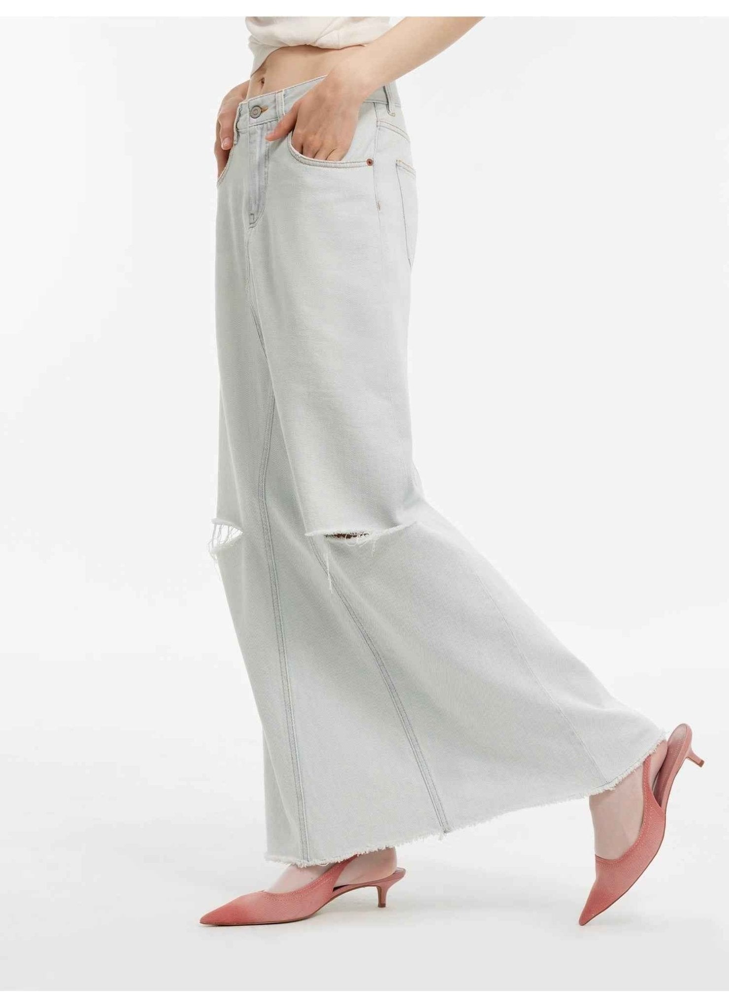 Firelady Fur Walden Pond Turkish imported wash-faded distressed denim A-line skirt for women, featuring holes and a casual style.