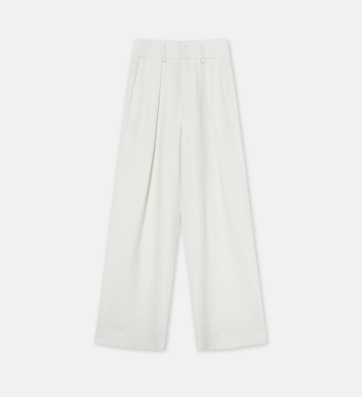 White women's wide-leg casual pants by Firelady Fur featuring a high waist and floor-length drape, styled with a relaxed fit.